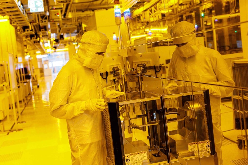 Workers in the clean room of a 300mm wafer fabrication plant operated by Infineon Technologies in Dresden, eastern Germany, on June 10, 2026. Photo: AFP