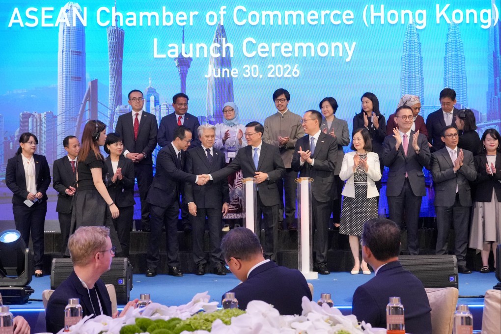 Dignitaries, including city leader John Lee (front centre), gather for a  group photo at the launch of the new chamber. Photo: May Tse