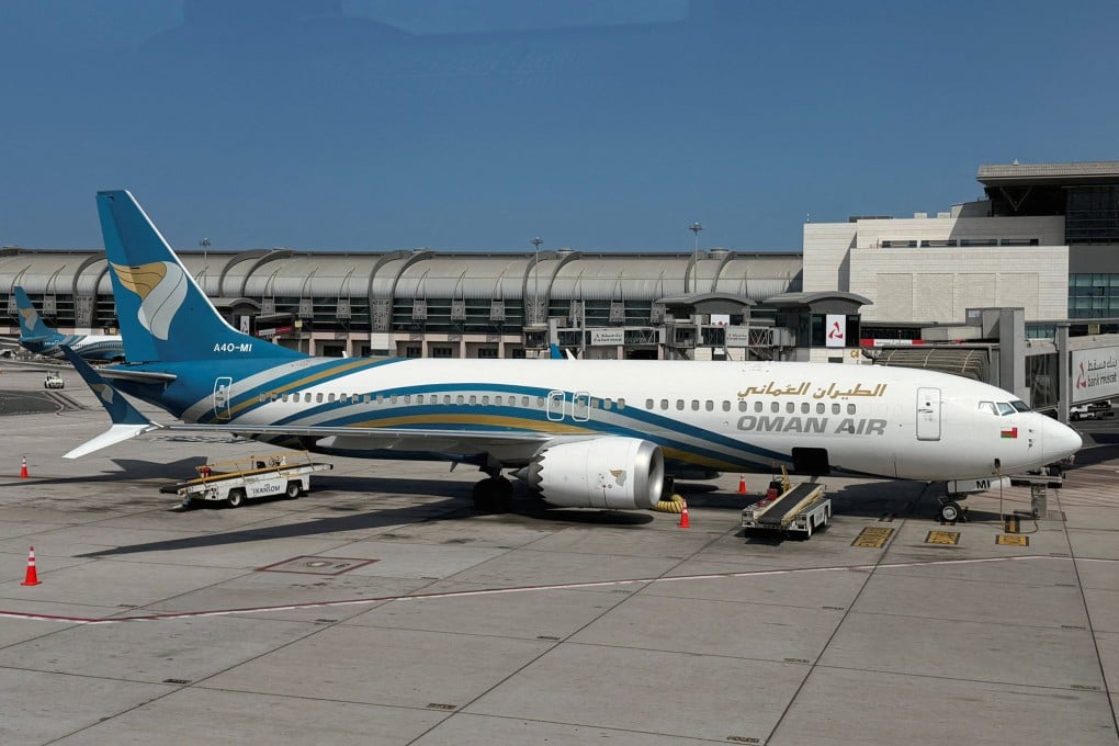 A Boeing 737 Max 8 operated by Oman Air sits on the tarmac at Muscat International Airport on March 13. Photo: Reuters