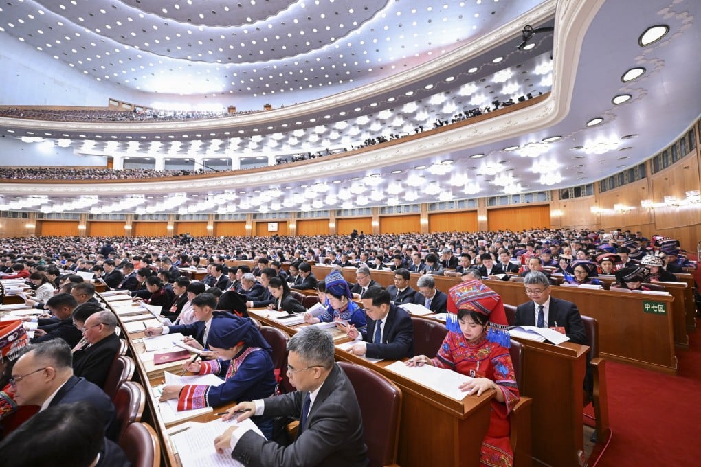 Delegates attend the opening meeting of the fourth session of the 14th National People’s Congress at the Great Hall of the People in Beijing on March 5. Photo: Xinhua