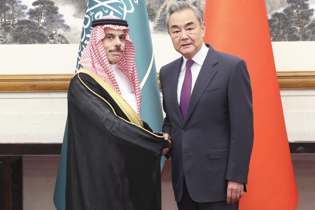 Chinese Foreign Minister Wang Yi (right) meets his Saudi counterpart Prince Faisal bin Farhan al-Saud in Beijing on Tuesday. Photo: Xinhua