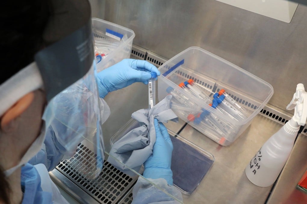 A laboratory technician at work in Queen Elizabeth University Hospital in Glasgow, Scotland, UK. On Tuesday, a patient at the hospital was tested for Ebola. Photo: AFP