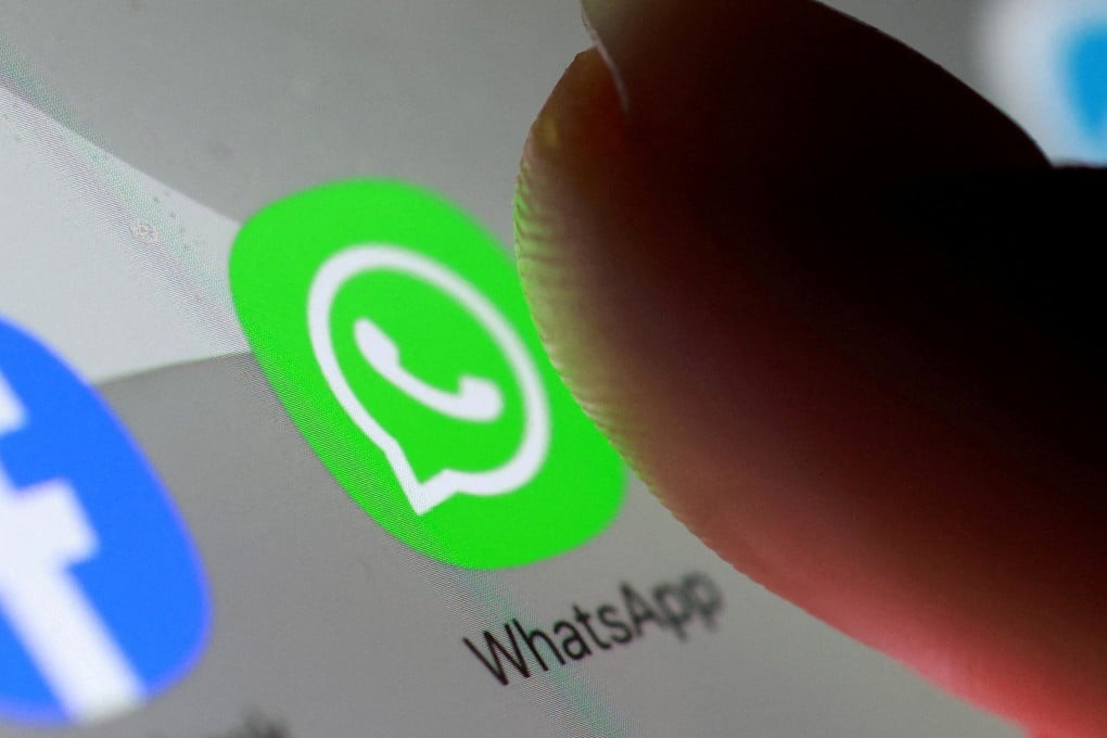 The WhatsApp app icon is seen on a smartphone. India has asked WhatsApp to justify the implementation of a planned feature covering usernames and to freeze the rollout. Photo: Reuters