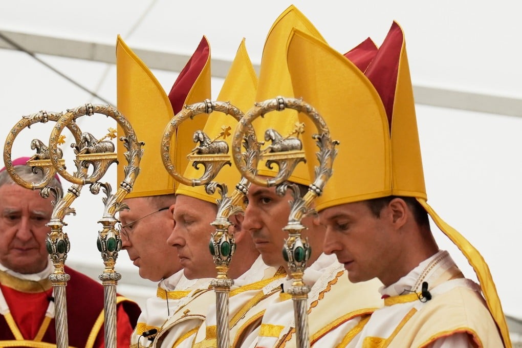 Newly consecrated bishops pray at the end of their consecration ceremony in Switzerland on Wednesday. Photo: AP