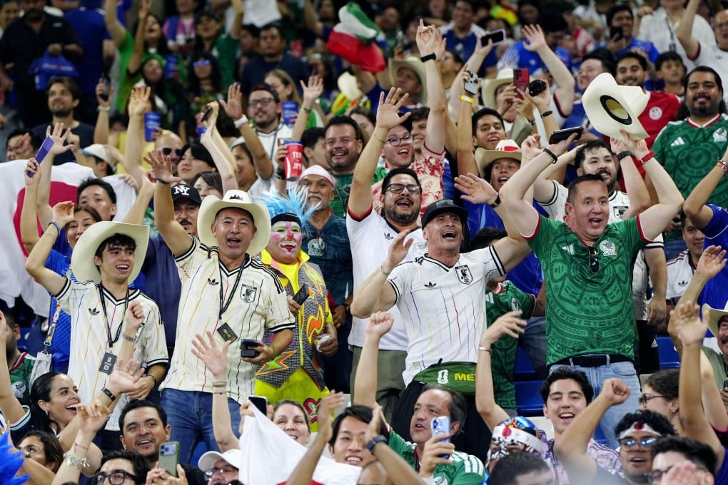 Fans cheer for Japan during a World Cup Group F match against Tunisia at Monterrey Stadium in Guadalupe, Mexico, on June 20. Photo: Kyodo