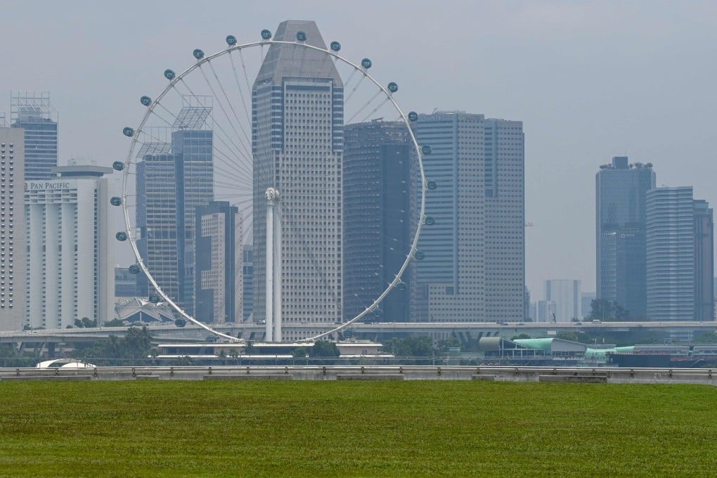 The Singapore city skyline is seen shrouded with haze on September 29, 2023. Photo: AFP