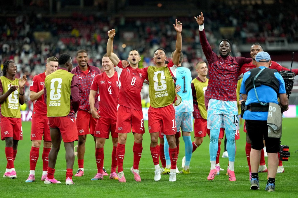 Switzerland players celebrate after winning the World Cup match against Algeria. Photo:  EPA