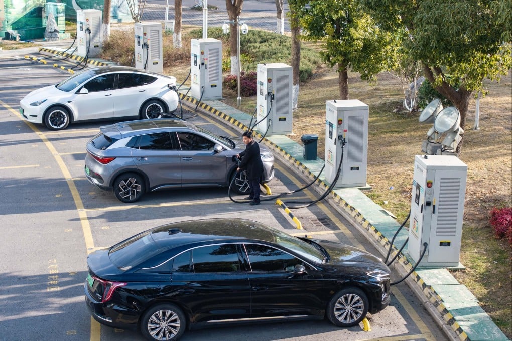 A driver charges an electric vehicle (EV) in Taizhou, east China’s Jiangsu province on January 22, 2026. China has built an extensive charging network in the world's biggest EV market. Photo: Xinhua