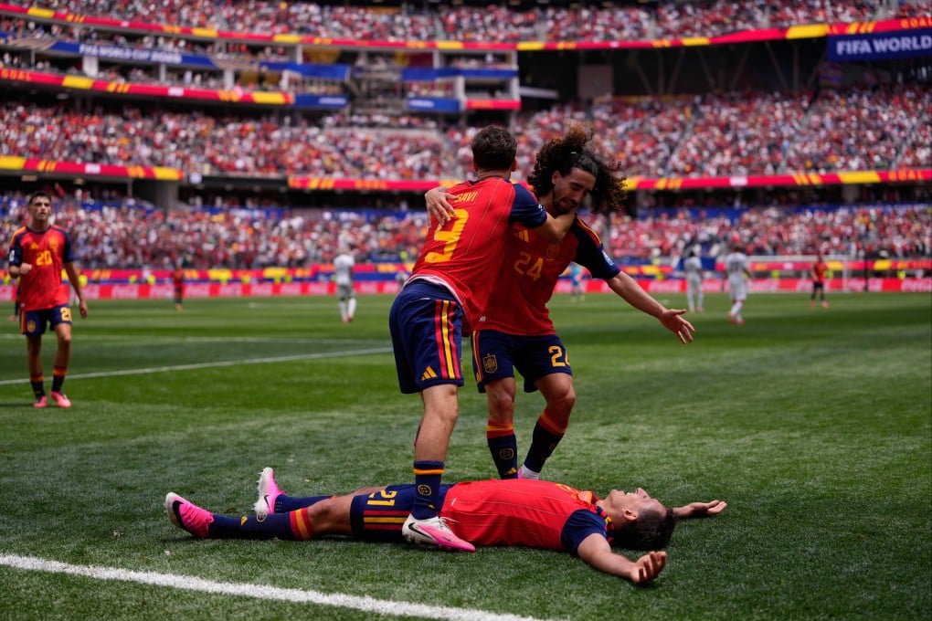 Spain’s Mikel Oyarzabal (centre) celebrates scoring his side’s third against Austria with teammates Gavi (left) and Marc Cucurella. Photo: AP