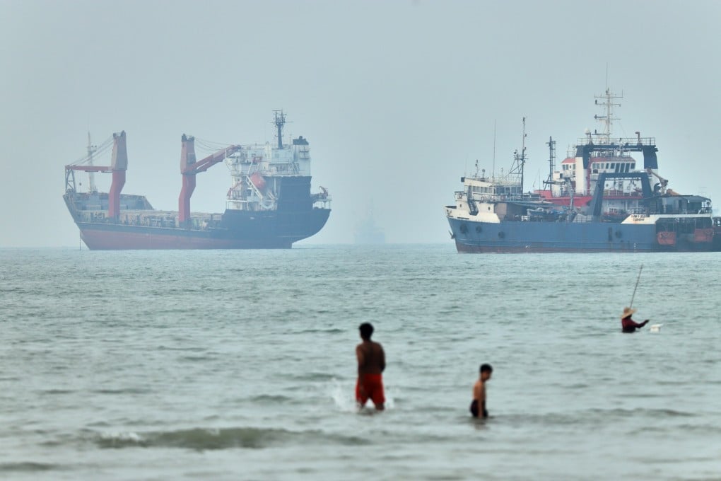 Ships are seen in the Strait of Hormuz off the coast of Bandar Abbas, Iran, on Tuesday. Photo: ISNA/WANA/Reuters