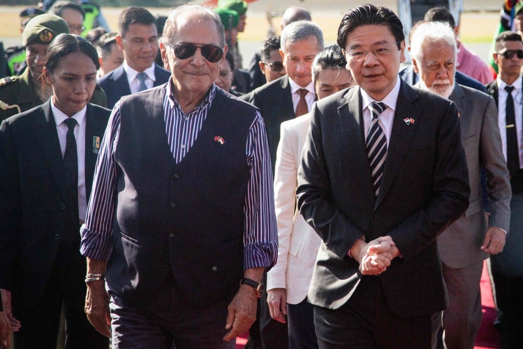 Singapore’s Prime Minister Laurence Wong (front right) is accompanied by East Timor President Jose Ramos-Horta upon his arrival in Dlili on Thursday. Photo: AFP