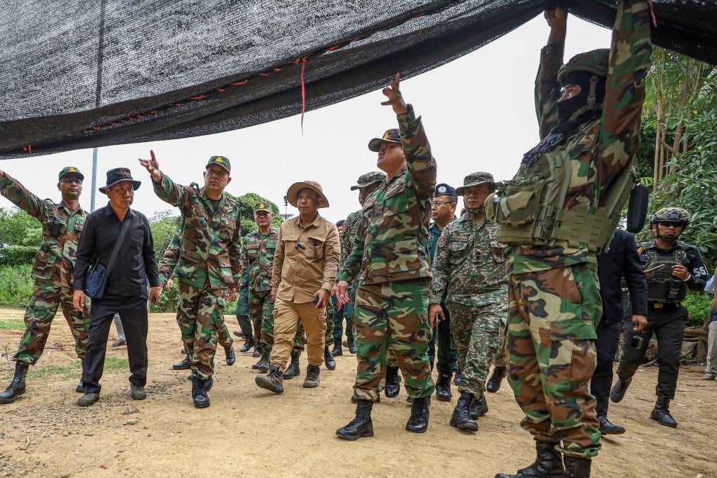 The Asean Observer Team visits an area of Cambodia’s Banteay Meanchey province where a civilian was killed. Photo: AKP/AFP