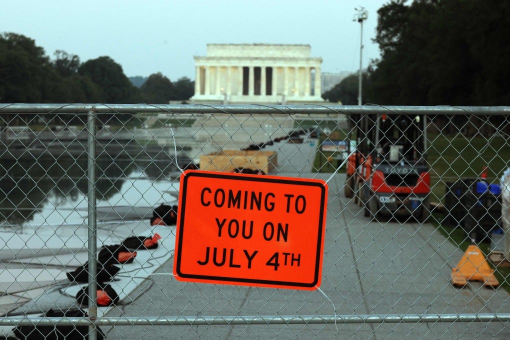 The Lincoln Memorial Reflecting Pool is fenced off on Thursday in preparation for Independence Day fireworks. Photo: AFP
