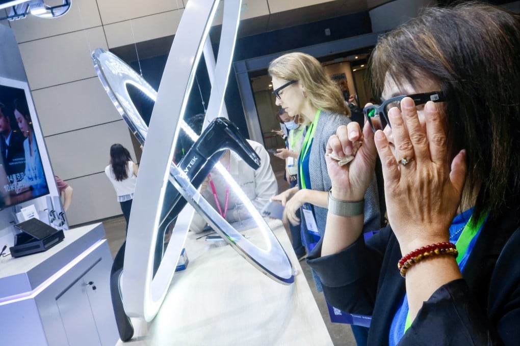People try products at AI+ Power 2026, Hong Kong’s largest artificial intelligence expo and conference, at the Hong Kong Convention and Exhibition Centre in Wan Chai on June 4. Photo: Jonathan Wong
