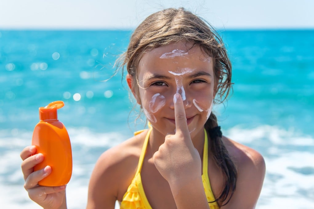 Children should wear sunscreen with a high SPF and UVA protection, and should reapply regularly, according to a dermatologist and a cancer research expert, who explain why sunburn is so dangerous for children and how to protect them. Photo: Shutterstock