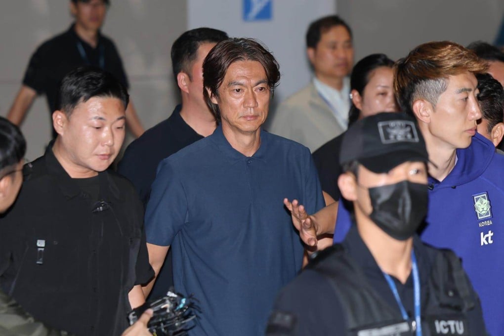 South Korea’s head coach Hong Myung-bo (centre) and members of the national football team arrive at Incheon International Airport on Tuesday. Photo: The Korea Times