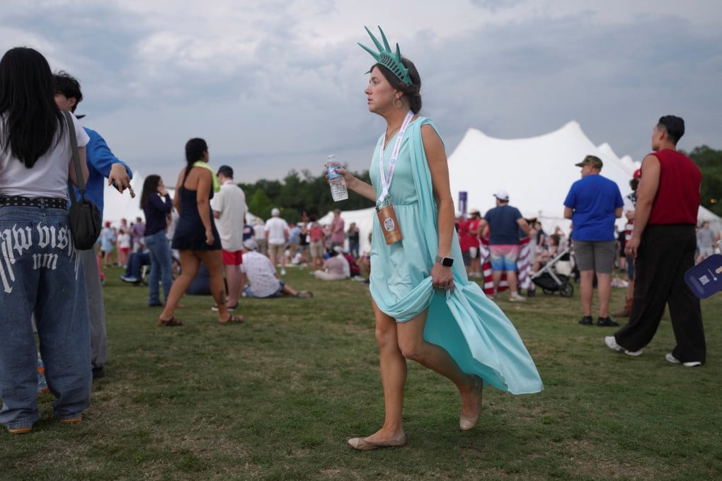 People evacuate as stormy weather approaches ahead of a July 4 rally in Washington on Saturday. Photo: Reuters
