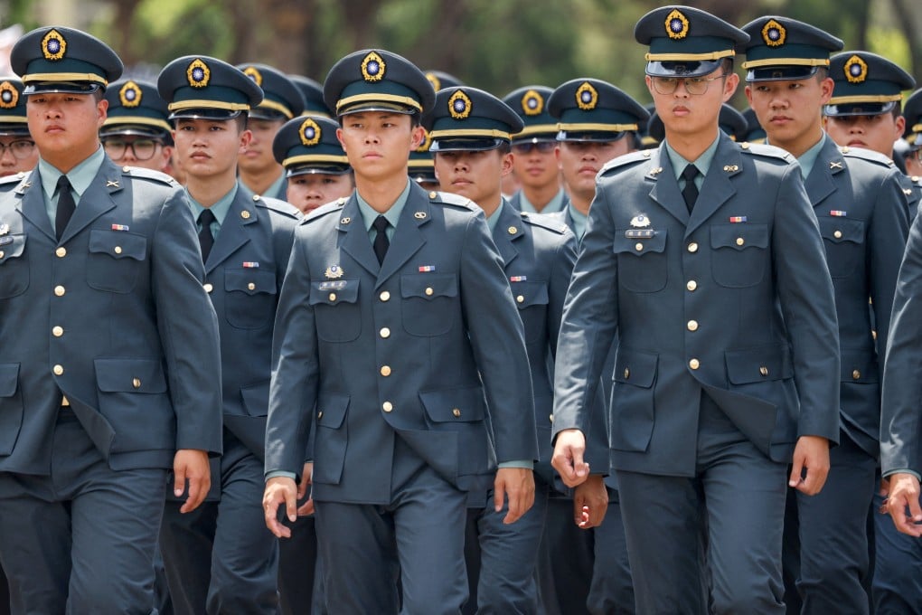 Military cadets march during a graduation ceremony in Taipei on June 30. Photo: Reuters