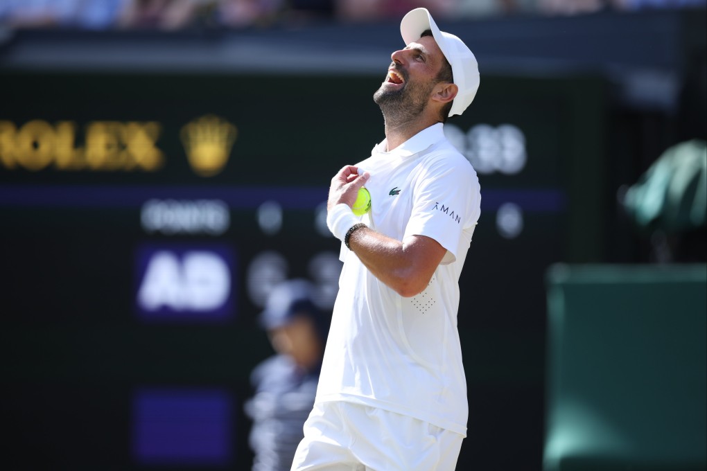 Serbia’s Novak Djokovic celebrates his win against Russia’s Roman Safiullin on Sunday. Photo: EPA