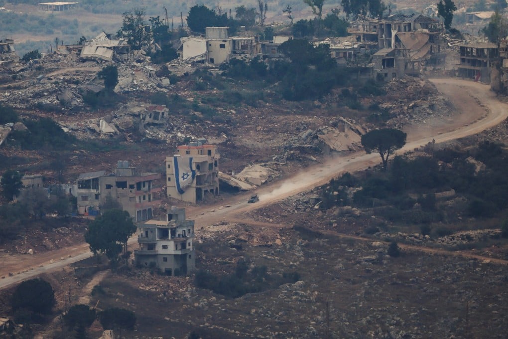 A building with an Israeli flag in southern Lebanon, as seen from the Israeli side of the Israel-Lebanon border. Photo: Reuters