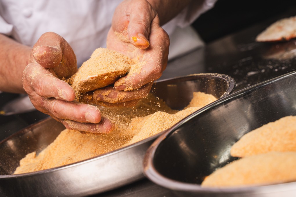 The stuffed crab shell at Seventh Son is dipped in egg and breadcrumbs twice before being fried. Photo: Alexander Mak