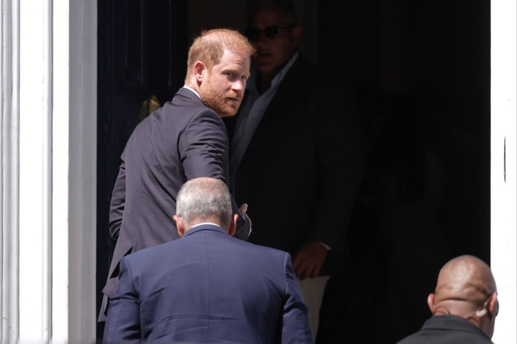 Prince Harry arrives for the Invictus Games Foundation Conversation: From Policy to Practice, at Chatham House in the UK on Tuesday. Harry has said his litigation was a primary source of his falling out with his father and brother, Prince William. Photo: dpa