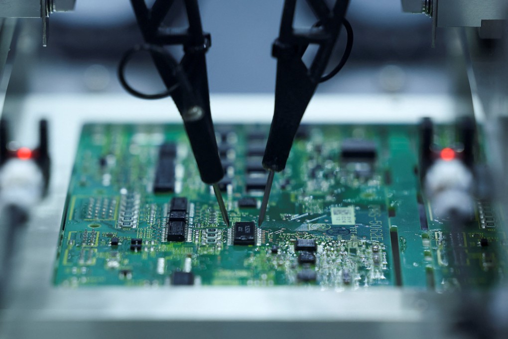 A demonstration of robots assembling semiconductor chips. Photo: Reuters