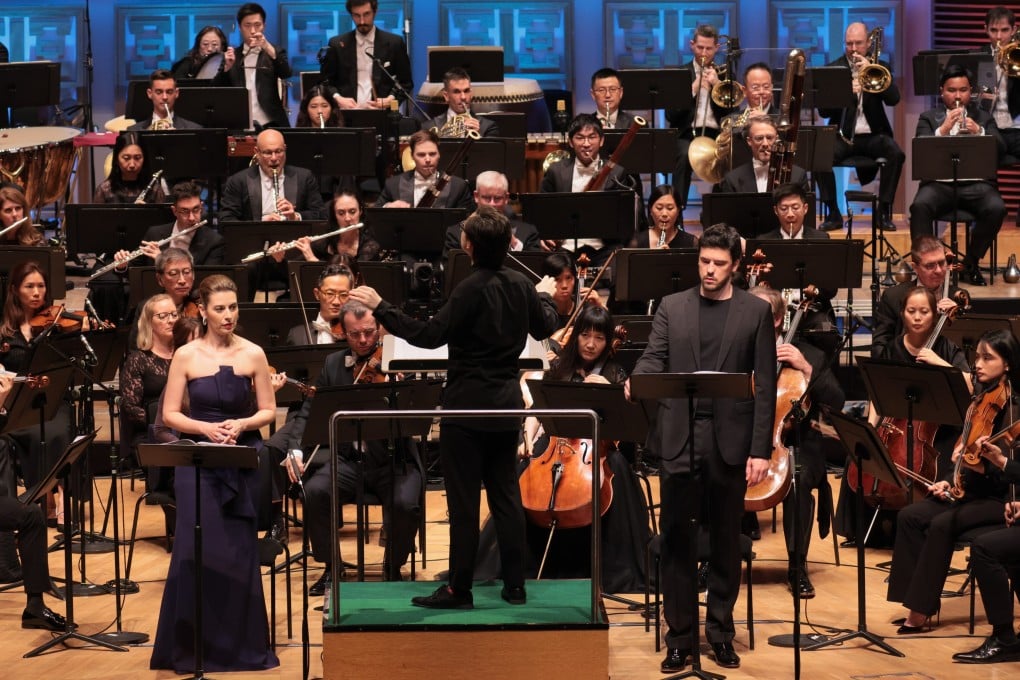 With Tarmo Peltokoski conducting, soprano Chen Reiss (left) and bass-baritone Andre Schuen (right) on stage with the Hong Kong Philharmonic Orchestra and three choirs for Ralph Vaughan Williams’ A Sea Symphony at the Hong Kong Cultural Centre on July 3, 2026. Photo: HK Phil/Keith Hiro