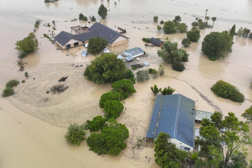 Homes are submerged in a flood caused by Cyclone Gabrielle in Awatoto, near the city of Napier in New Zealand, on February 14, 2023. Photo: AFP