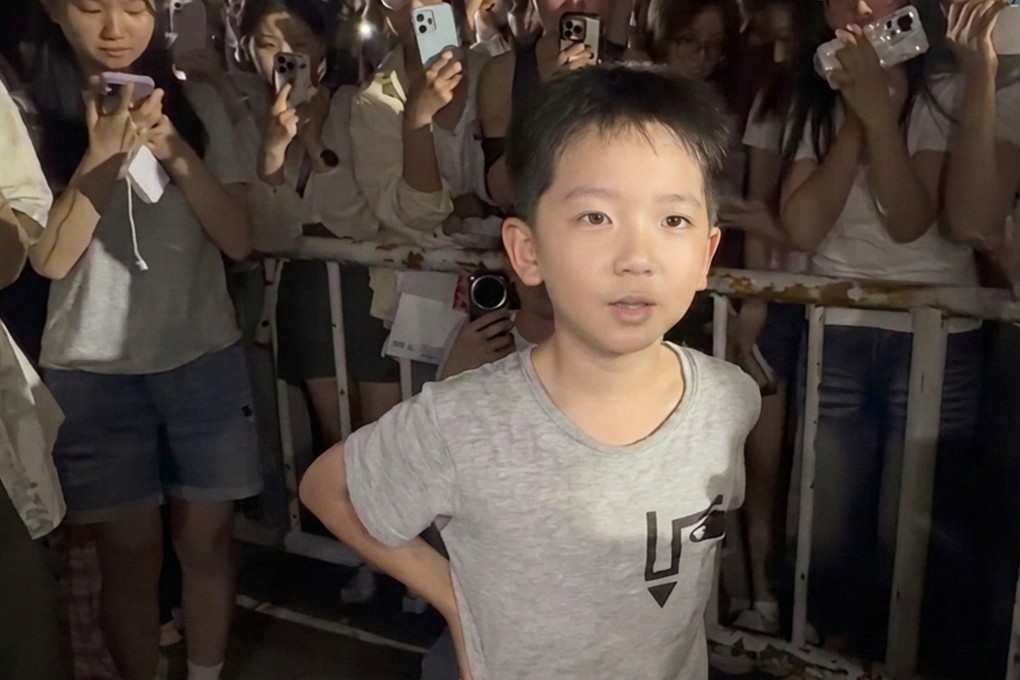 An eight-year-old Chinese boy touched hearts online after stepping up to promote his single mother’s small recycling business during a football match. Photo: Weibo