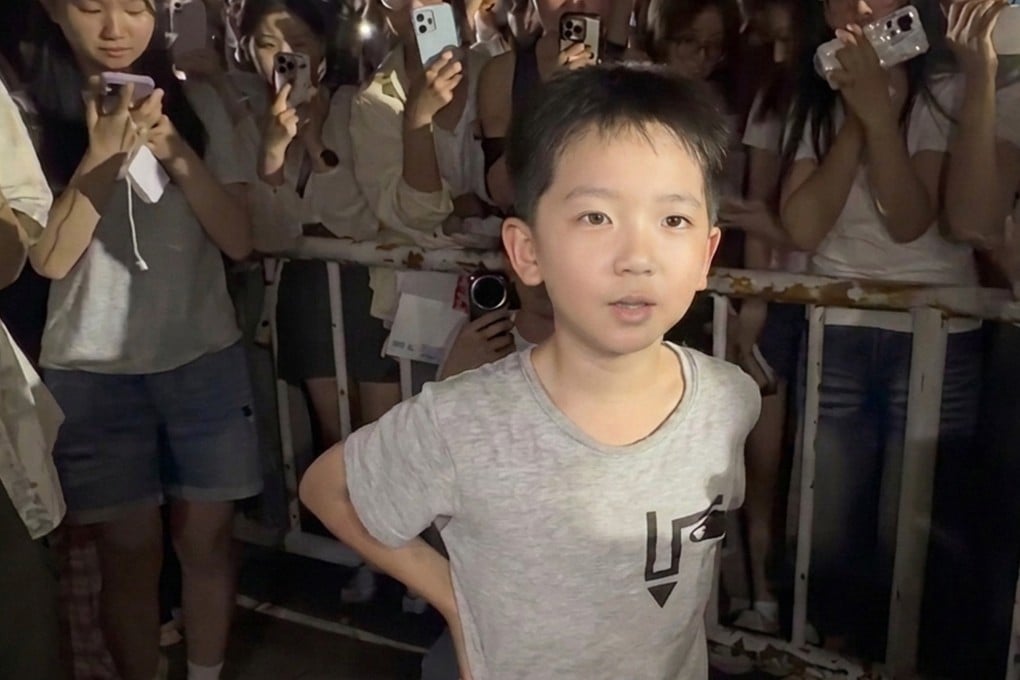 An eight-year-old Chinese boy touched hearts online after stepping up to promote his single mother’s small recycling business during a football match. Photo: Weibo