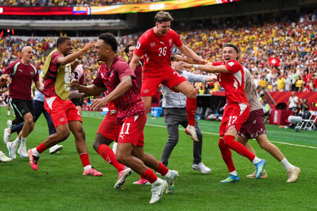 Ruben Vargas (right) celebrates with his Swiss teammates after scoring the winning penalty in the shootout win over Colombia in Vancouver on Tuesday. Photo: AFP