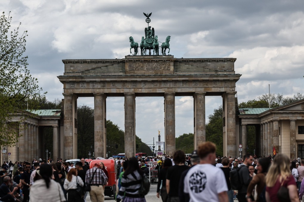 People walk in front of Brandenburg Gate in Berlin. A court in Berlin on Wednesday convicted a 41-year-old palliative care doctor of killing 12 women and three men during home visits between September 2021 and July 2024. Photo: EPA-EFE
