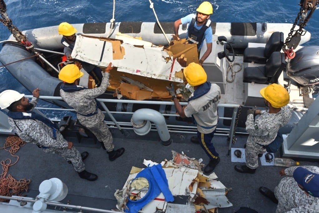 Pakistan Navy personnel shift the wreckage of a cargo plane of the private carrier K2 Airways into a naval ship after recovering them from deep sea near Omara, a town some 360km (220 miles) west of Karachi, Pakistan, on Wednesday. Photo: Pakistan Navy via AP