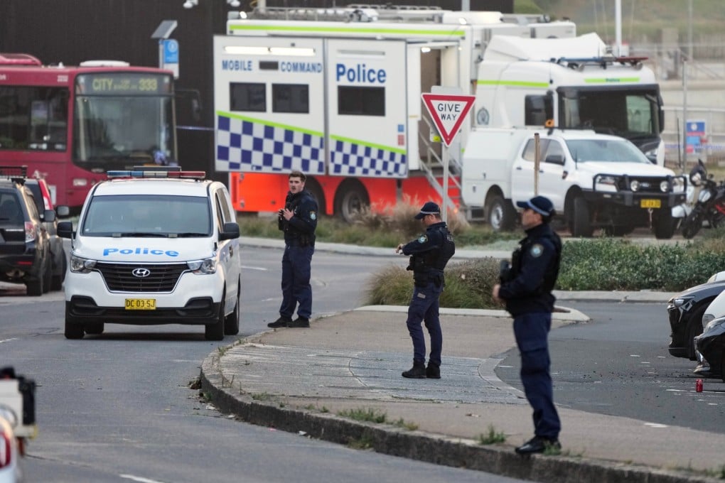 Police patrol in the early morning of December 15 at Sydney’s Bondi Beach following the previous day’s shooting. Photo: AP