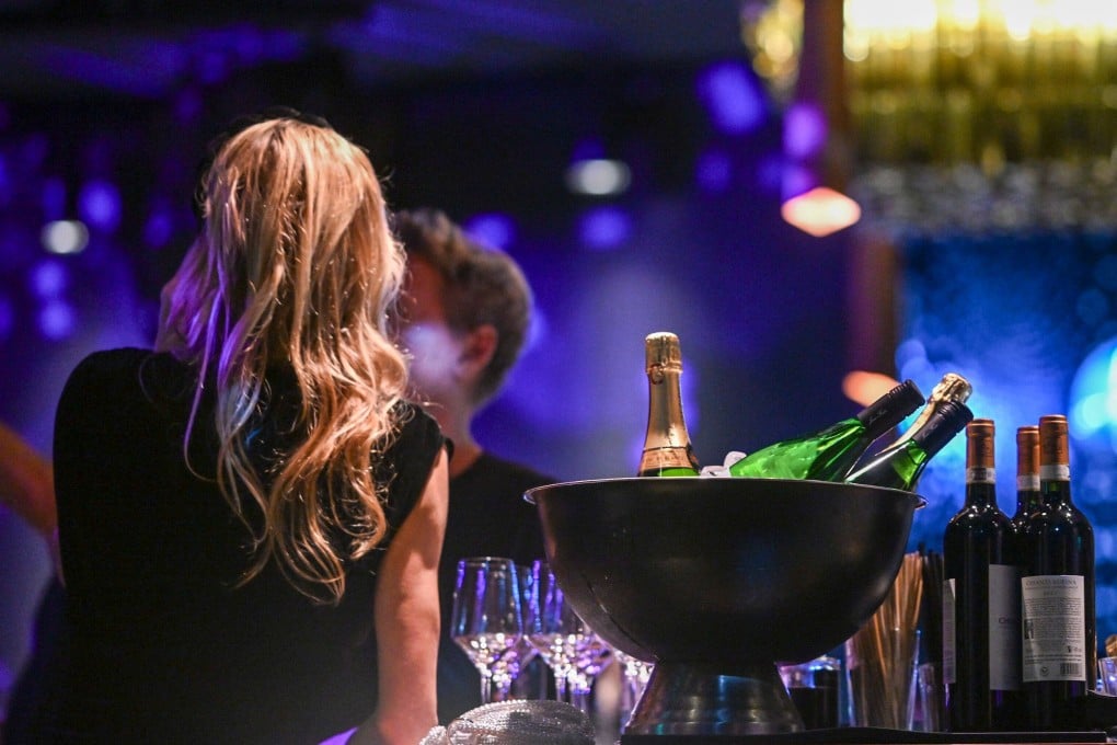 An event organised by new AI dating app Known invited users out for champagne and caviar bumps giving them an envelope revealing who the AI matchmaker had paired them up with. Photo: Jens Kalaene/dpa