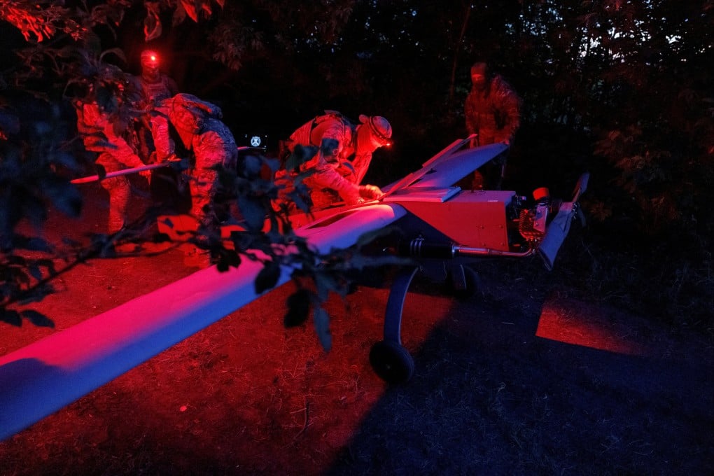 Ukrainians prepare a Zozulia mid-strike drone for flight, at an undisclosed location in southern Ukraine. Photo: Reuters