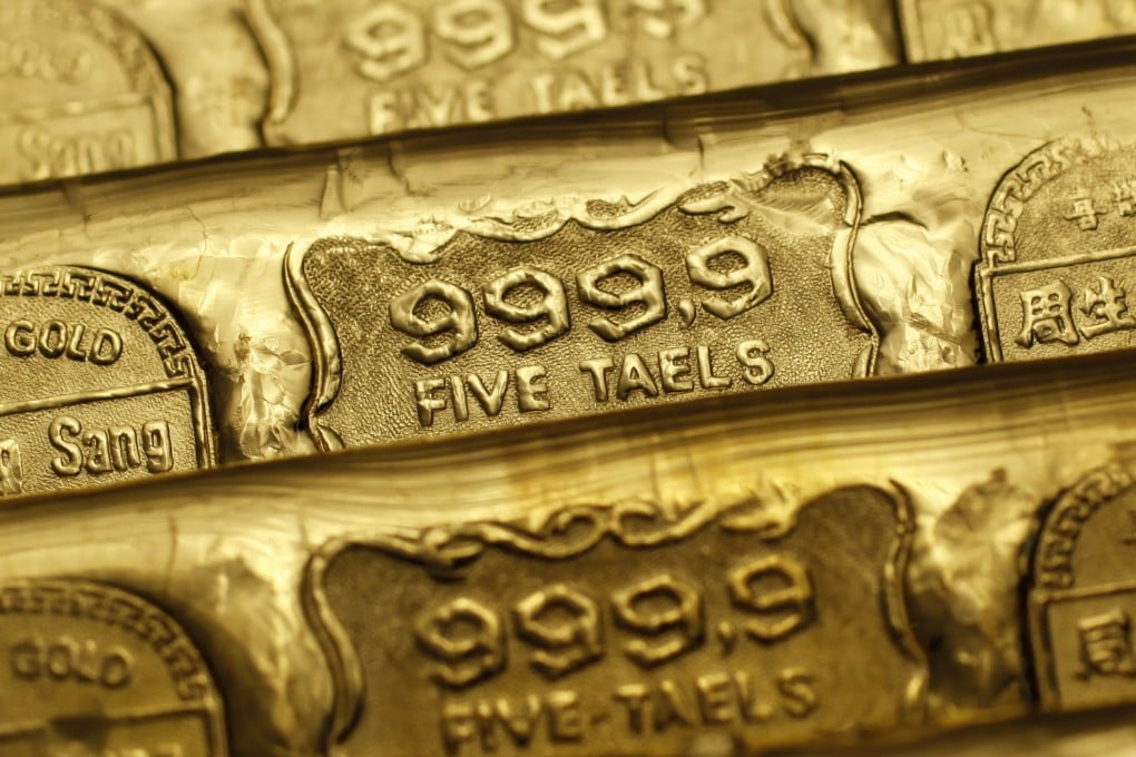 Five-tael (190 gram) gold bars are seen at a jewellery store in Hong Kong in this file photo taken August 11, 2011. Photo: Reuters