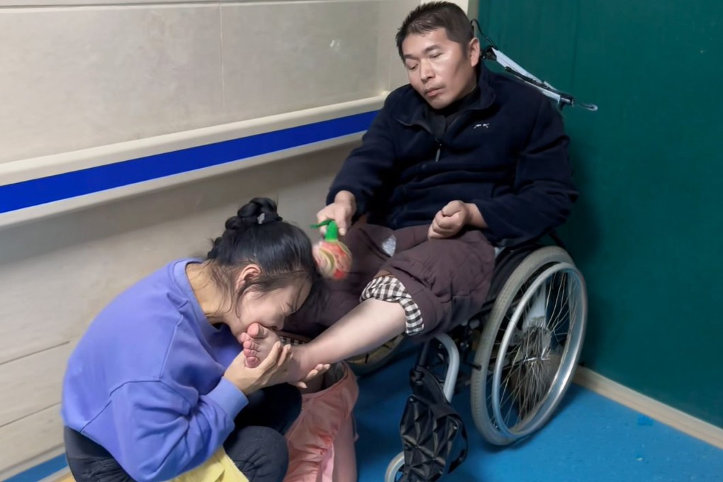 A Henan woman woke her husband from a seven-year vegetative state — caused by a heroic rescue — by biting his toes. Photo: Douyin