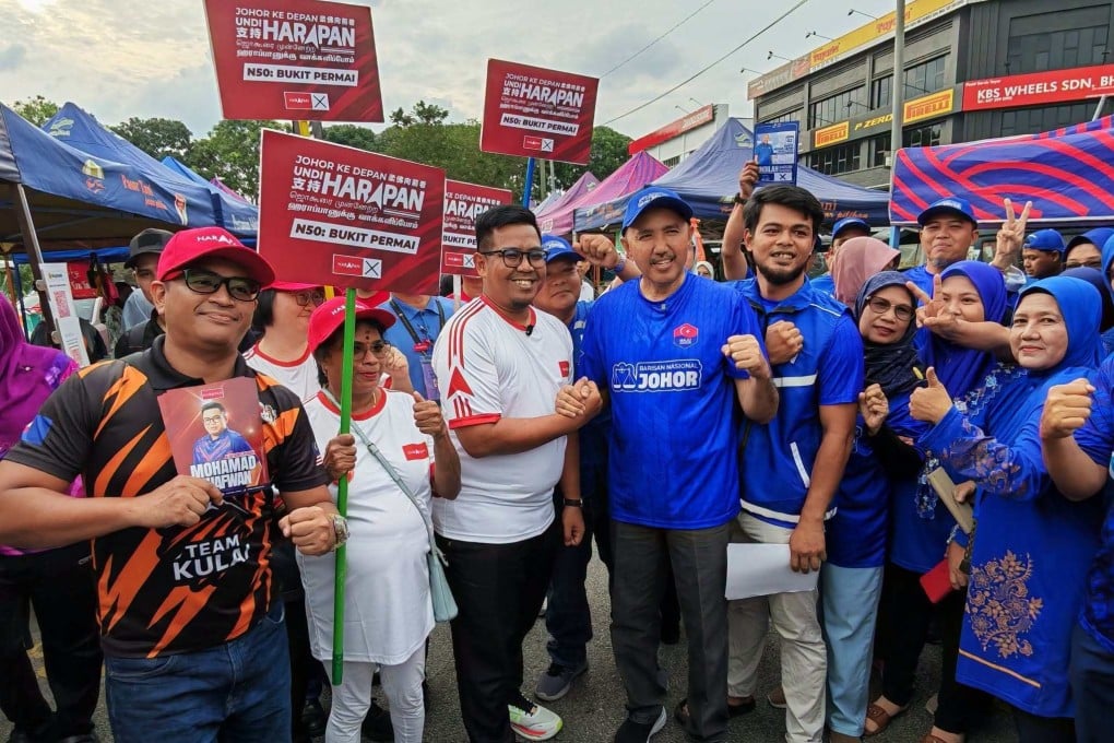 A Democratic Action Party candidate meets supporters while campaigning in Kulai, Malaysia’s Johor state, on July 1. Photo: Facebook/dapjohor.my