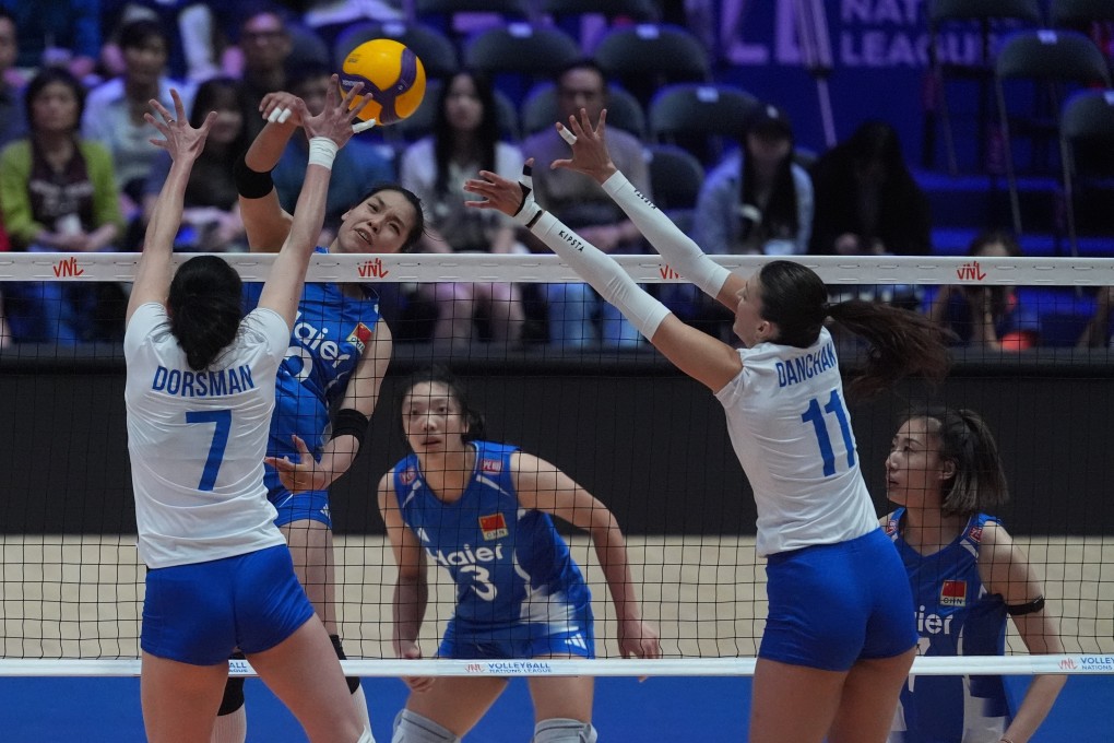 China’s Zhuang Yushan tries to get through the Ukraine defence in their  Women’s Volleyball National League Hong Kong match at Kai Tak Arena on Thursday. Photo: Elson Li