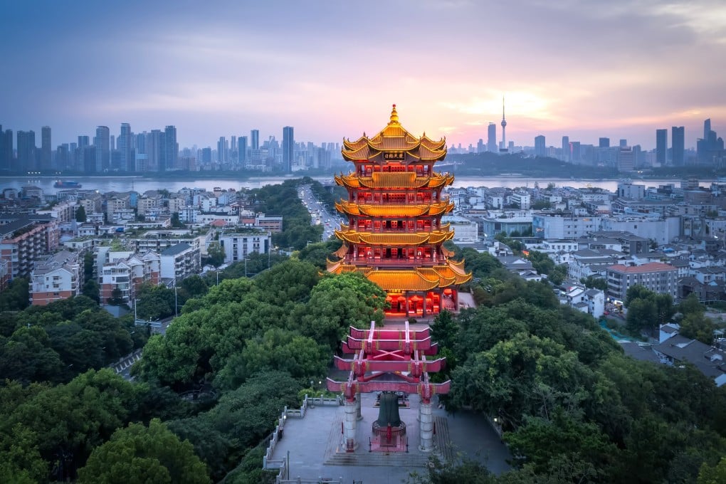 Wuhan’s skyline with the Yellow Crane Tower in the foreground with the Yangtze River behind it. Hubei province’s sprawling capital is known for its breakfast dishes, its natural water features and for being the historical heartland of China’s Chu people. Photo: Shutterstock