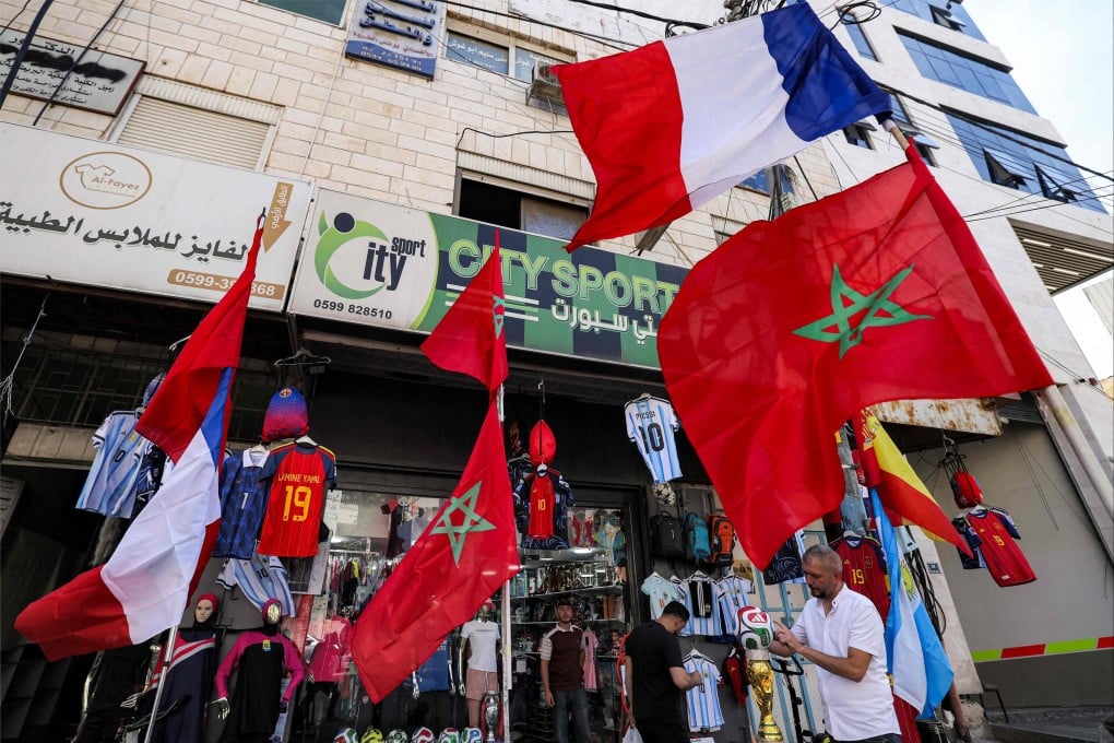 Moroccan and French flags, and jerseys with the names of Lionel Messi and Spain's Lamine Yamal, outside a sports shop in Hebron in the occupied West Bank on Wednesday. Photo: AFP
