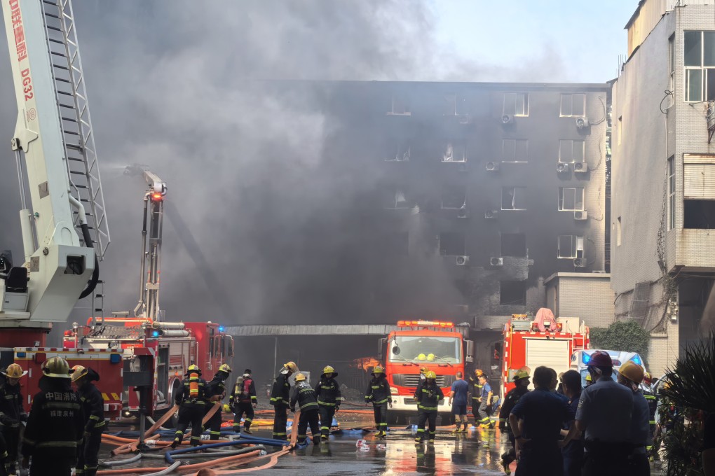 Firefighters attend a footwear factory fire in the township of Chendai in Jinjiang on Thursday. Photo: Xinhua