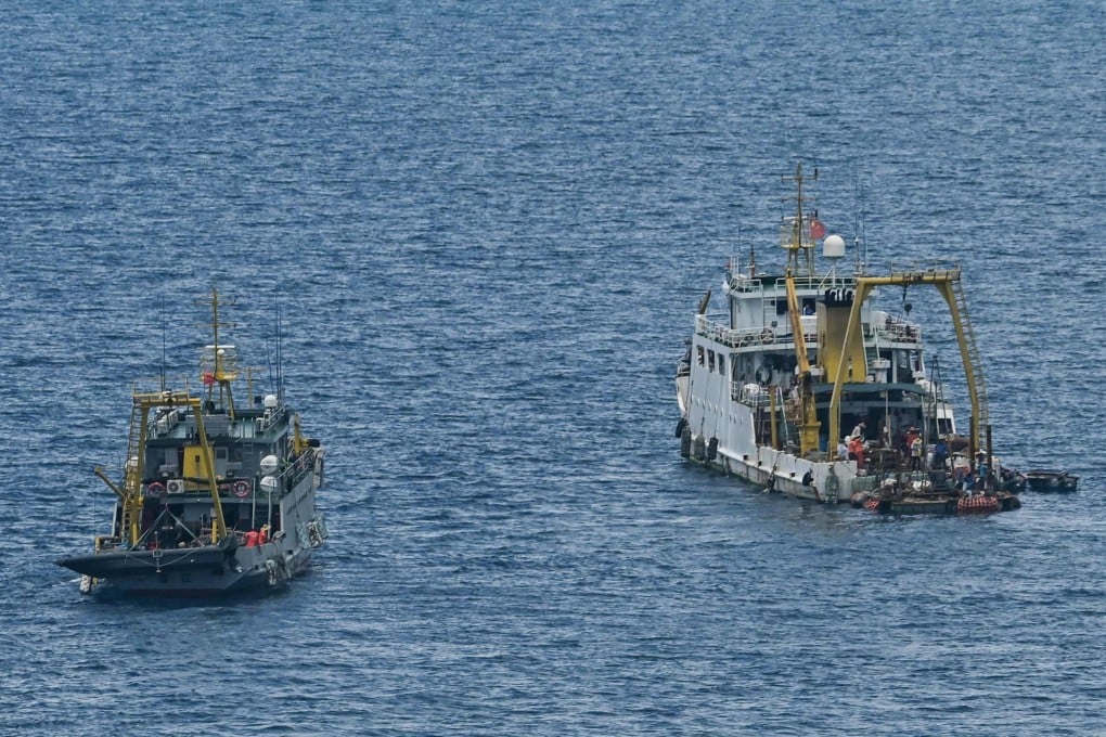 Ships identified by the Philippine Coast Guard as Chinese research vessels are seen at Scarborough Shoal in the disputed South China Sea on June 15. Photo: AFP