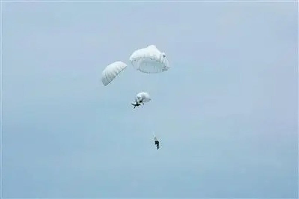 The two Chinese soldiers’ parachutes became intertwined and entangled during a training exercise on May 28. Photo: Handout