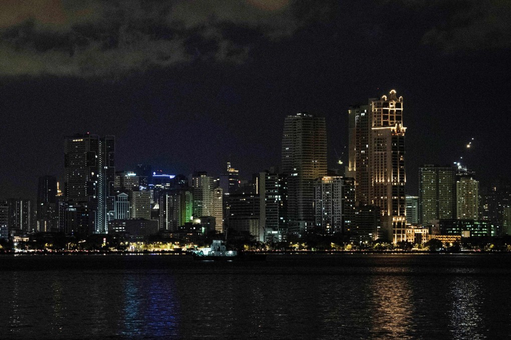 Manila’s skyline. The Philippines’ economic upgrade to upper-middle-income status contrasts with citizens’ struggles with inflation. Photo: AFP