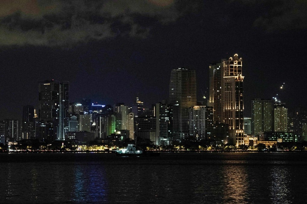 Manila’s skyline. The Philippines’ economic upgrade to upper-middle-income status contrasts with citizens’ struggles with inflation. Photo: AFP
