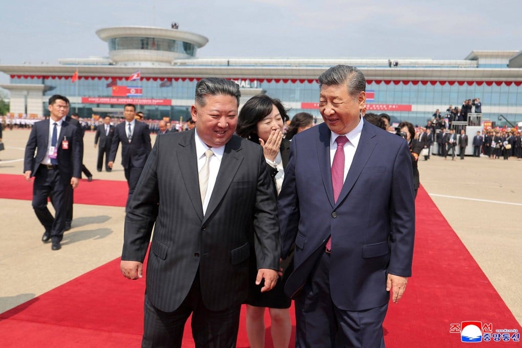 North Korean leader Kim Jong-un (left) sees off Chinese President Xi Jinping at Pyongyang International Airport in June after Xi’s first trip to North Korea in seven years. Photo: KCNA