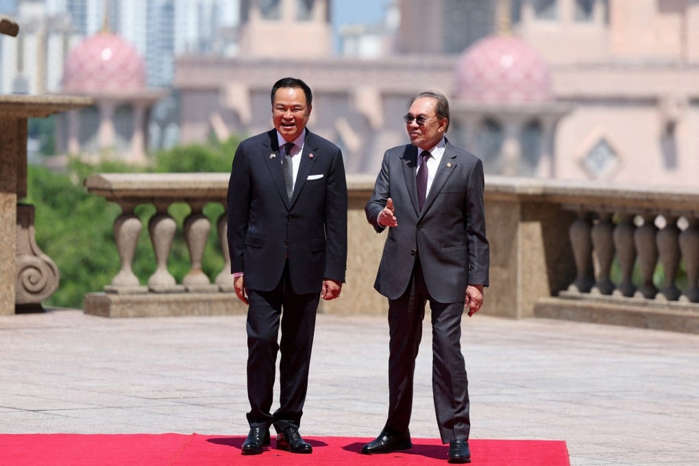 Thai Prime Minister Anutin Charnvirakul (left) with his Malaysian counterpart Anwar Ibrahim in Putrajaya on Thursday. Photo: Reuters